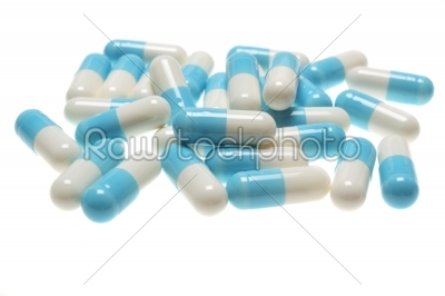 blue pills on white background