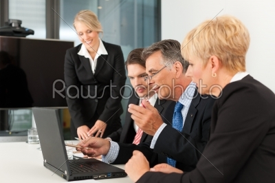Business - team meeting in an office