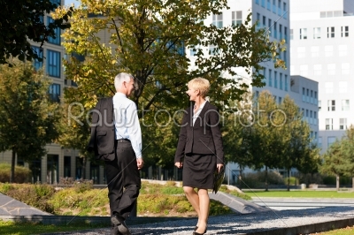 Business people greeting outdoors