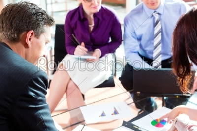Business people having meeting in office