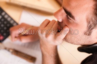 Carpenter planning his work 