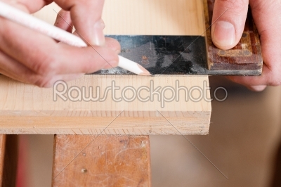 Carpenter with angle and pencil