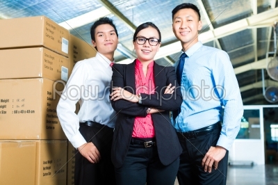 CEO and Businessmen in a warehouse