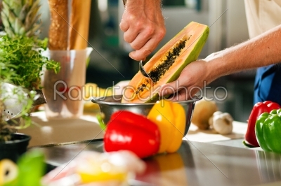 Chef preparing fruits