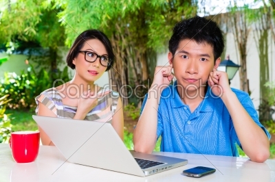 Chinese mother and Asian Son at home