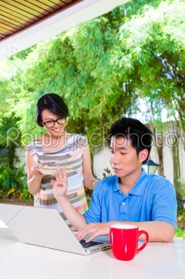 Chinese mother and Asian Son at home