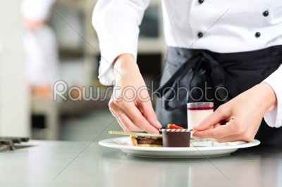 Cook, pastry chef, in hotel or restaurant kitchen