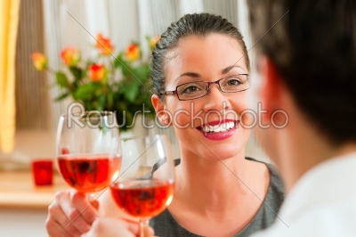 Couple drinking rose wine