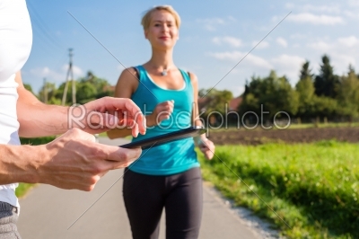 couple running, sport jogging on rural street