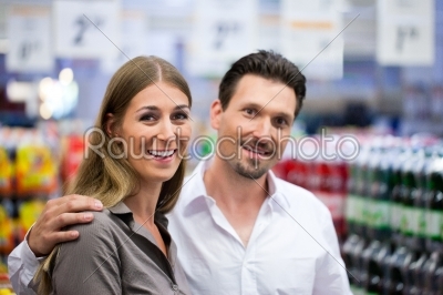 Couple Shopping at Supermarket