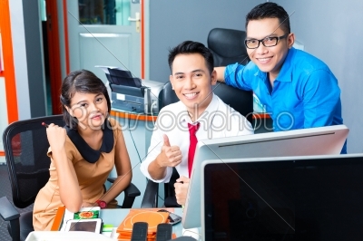 Creative Business Asia - Team Meeting in office