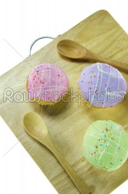 cupcake on wooden board