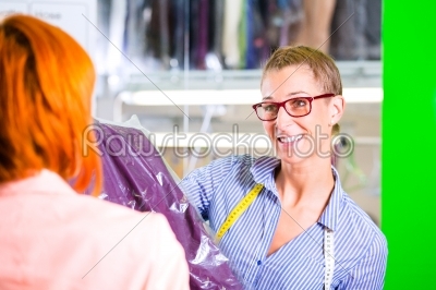 Customer in laundry shop or textile dry-cleaning 