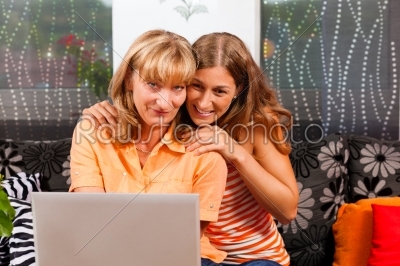 Daughter explaining internet to her mother