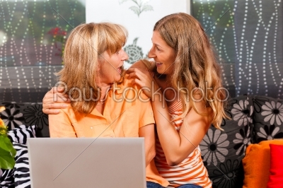 Daughter explaining internet to her mother