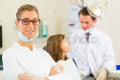 Dentist in her surgery