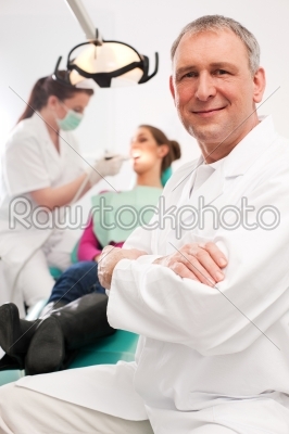 Dentist in his surgery