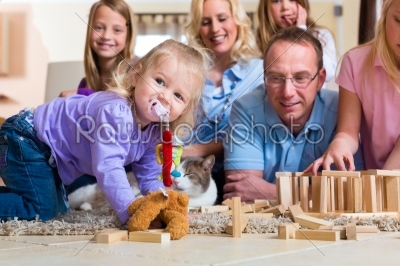 Family playing at home