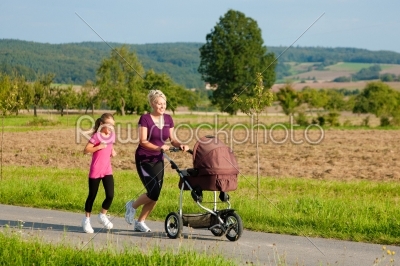 Family sport - jogging with baby stroller