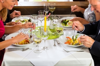 Family with adult kids in Restaurant