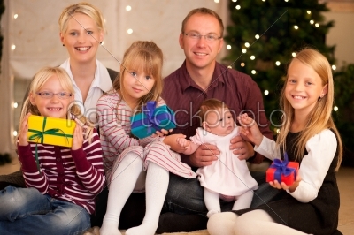 Family with presents at Christmas