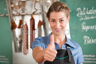 Female Butcher Showing Thumbs up
