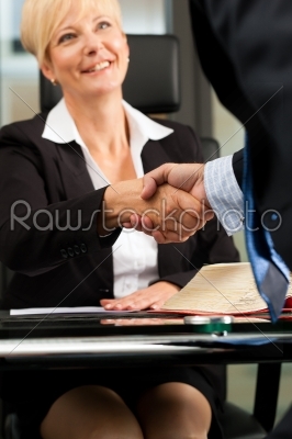 Female Lawyer or notary in her office
