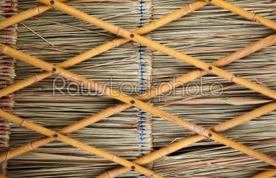 fencing bamboo panel with dry grass leaf