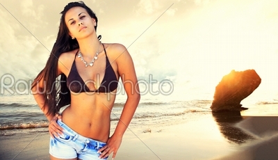 Fit beautiful woman in tropical beach