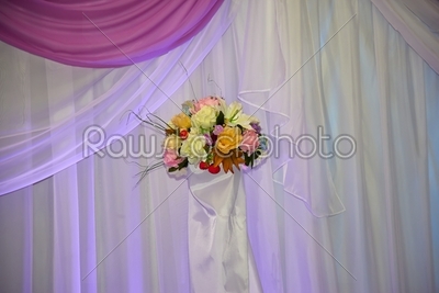 flowers on a white curtains hang