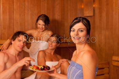 Four people or friends in sauna