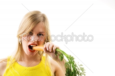 fresh carrot eaten by girl