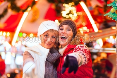 Friends during  the Christmas market or advent season