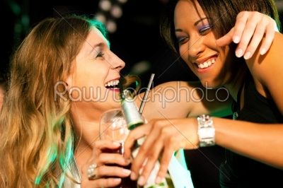 Friends having drinks in bar or club