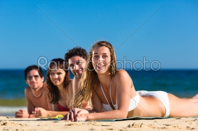 Friends on beach vacation in summer