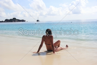 girl on the shore of the ocean