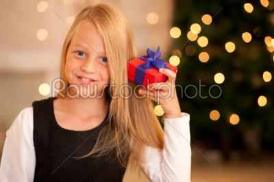 Girl with present at Christmas