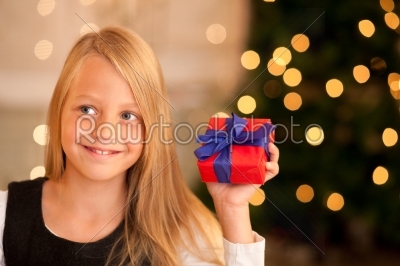 Girl with present at Christmas