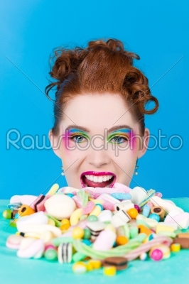 Girl with sweet goodies and candy