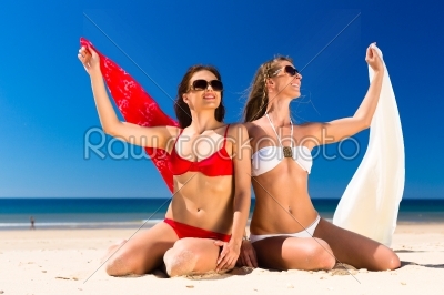 Girls enjoying freedom on the beach