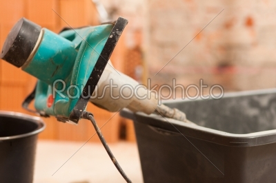 Hand mixer for mixing concrete