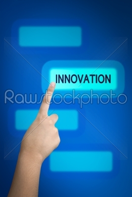 hand pressing innovation button on virtual touch screen 