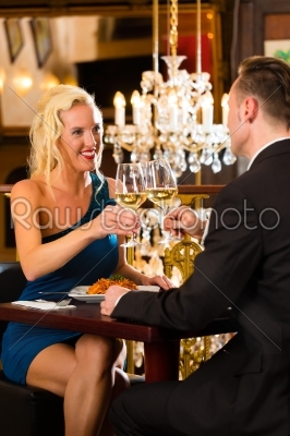 happy couple have a romantic date in restaurant