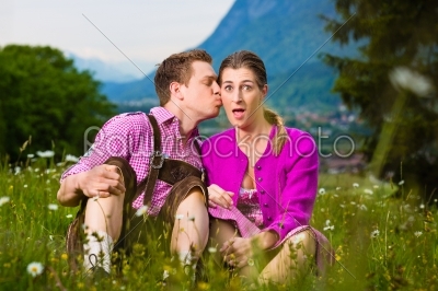 Happy couple in Alpine meadow