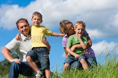 Happy family in summer