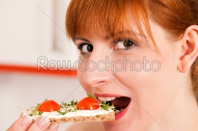 Healthy eating - woman with crispbread
