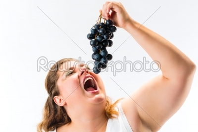 Healthy eating - woman with grapes
