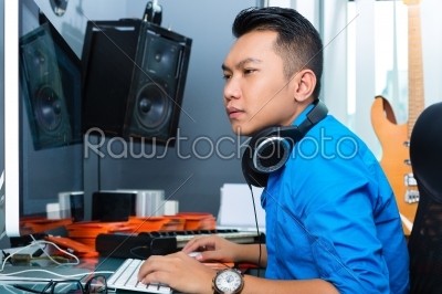 Indonesian man in recording studio