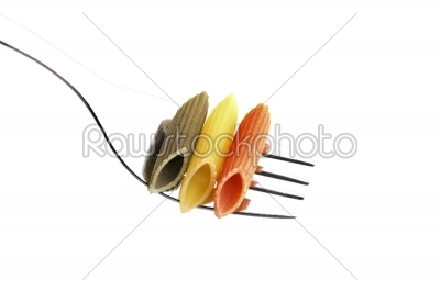 italian penne pasta on a fork