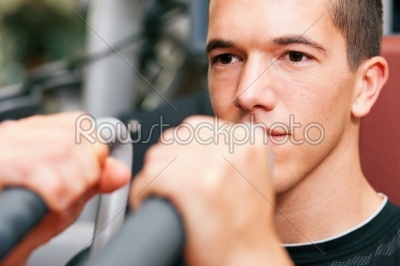 Man in gym exercising